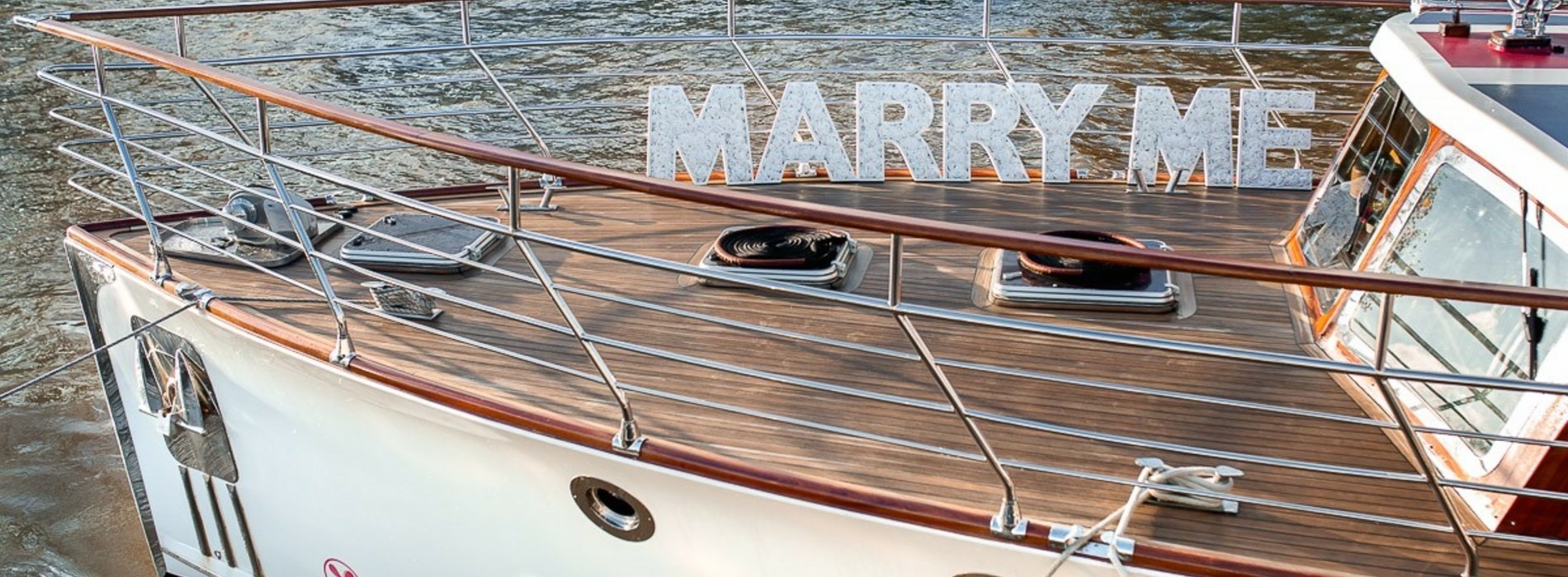 Luxury boat hire London with champagne and fine dining onboard