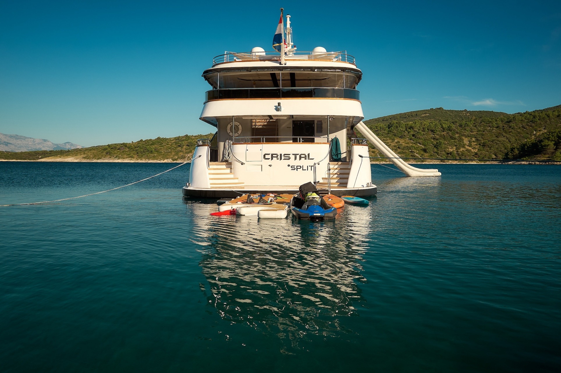 Over 12 guests enjoying a private yacht charter CRISTAL