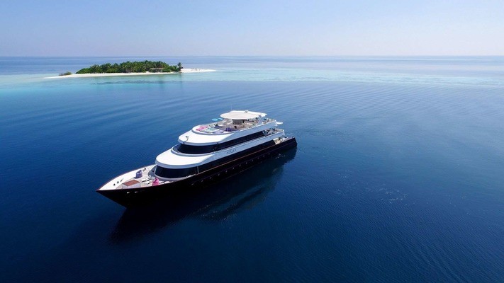 Azalea motor yacht in calm Maldives water